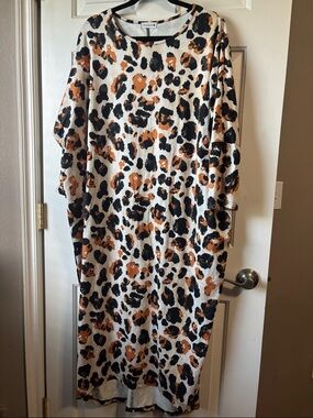 NUGGLES: Animal Print Midi Dress in Cream, Black & Rust